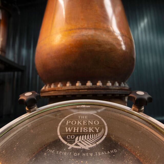 The Pokeno Whisky logo on their copper still